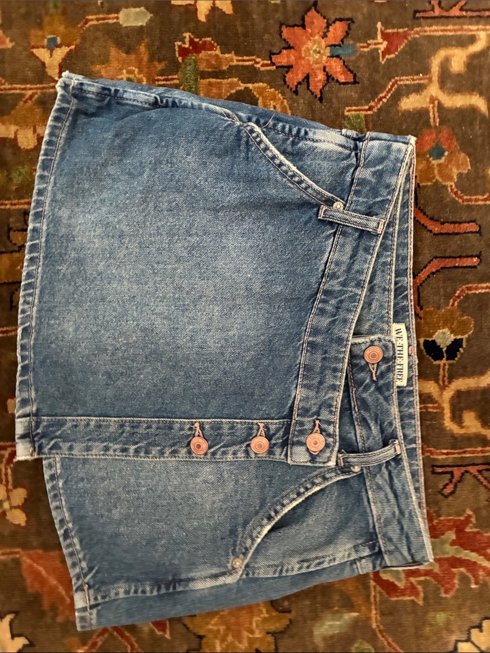 We The Free faded blue denim mini skirt